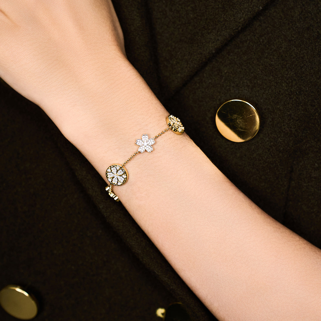 Cherry Blossom Symphony Pavé 7-Flower Zirconia Gold Station Bracelet (18K Gold Plated)