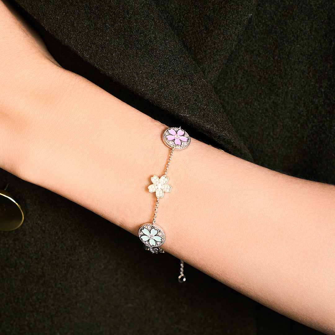 Cherry Blossom Symphony Enamel 7-Flower Silver Bracelet (Platinum Plated)