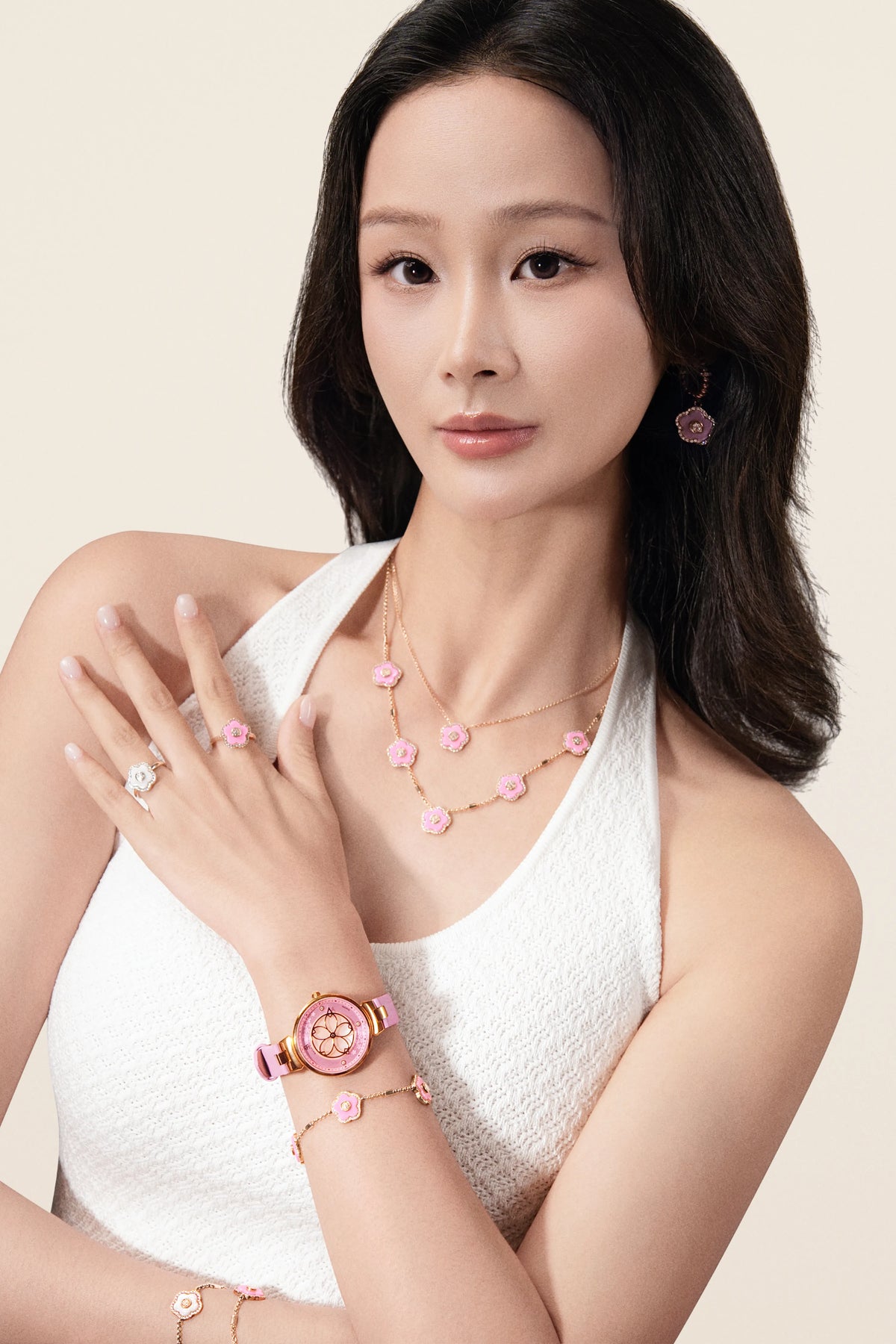 Model wearing Cherry Blossom watch, necklace, earrings, rings and bracelets