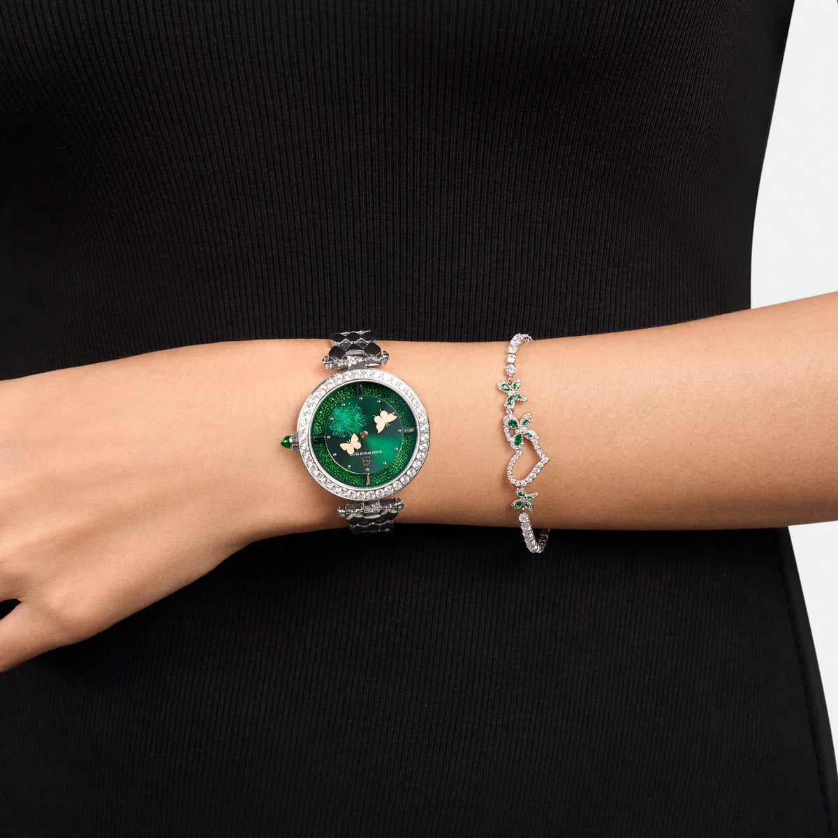 Model wearing a green watch and jewellery from BLACK BY BLUE BRAVE